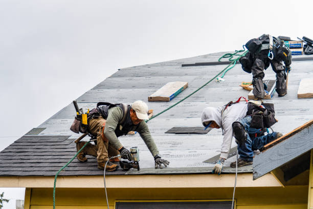 Professional Gutter Installation technician working in Newhall, CA